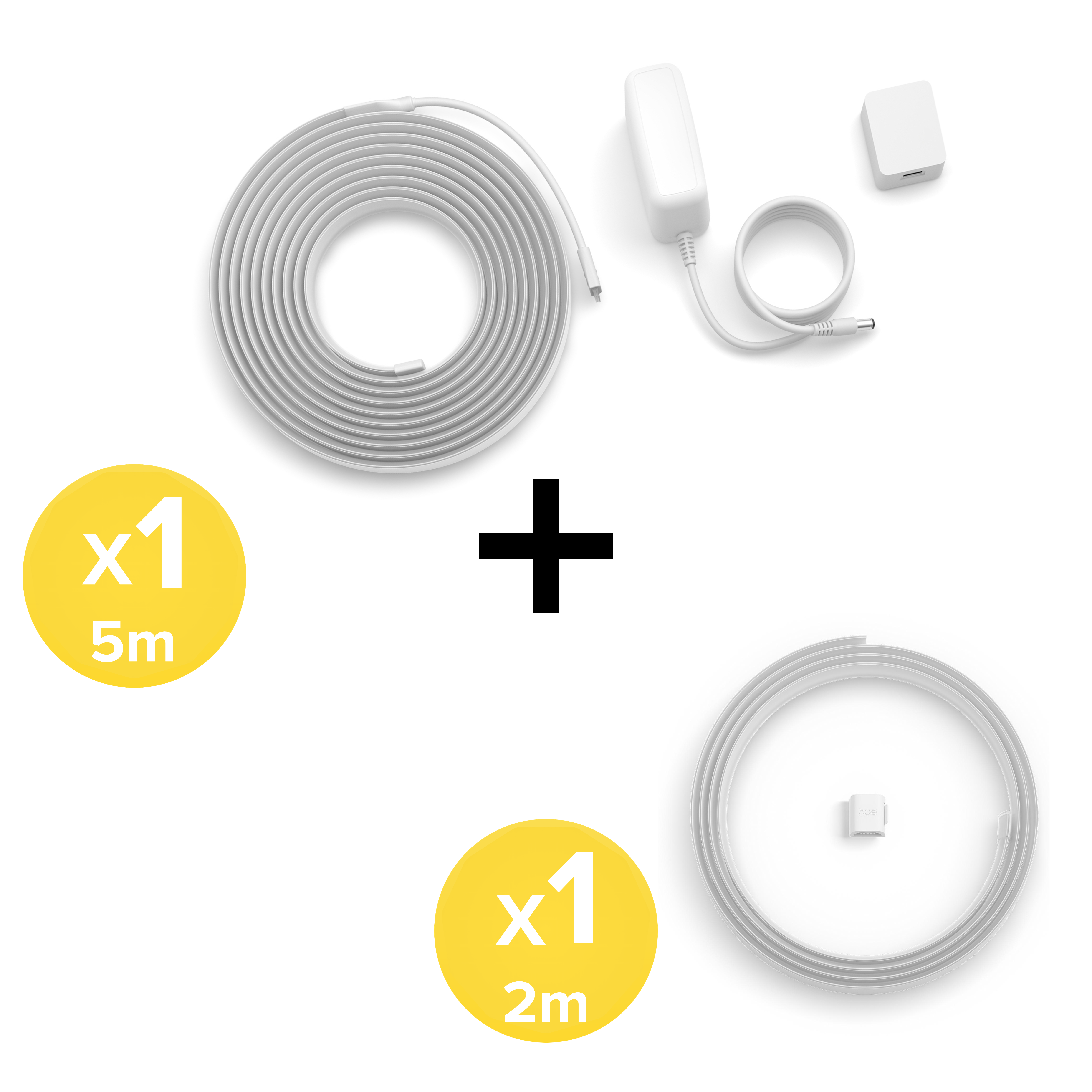 Una striscia LED da 5m, una da 2m e un alimentatore bianco sono mostrati su sfondo bianco.