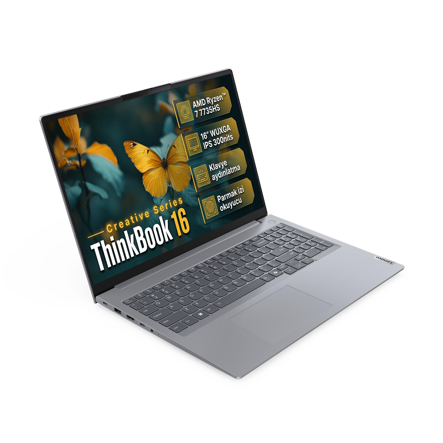 Beyaz arka planda ekranında sarı kelebek olan gri renkli Lenovo ThinkBook 16 dizüstü bilgisayar.