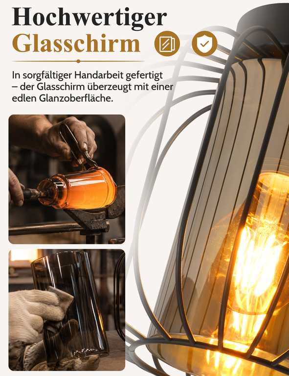 Handgefertigter Glaslampenschirm mit schwarzem Metallgitter und warmer LED-Glühbirne.
