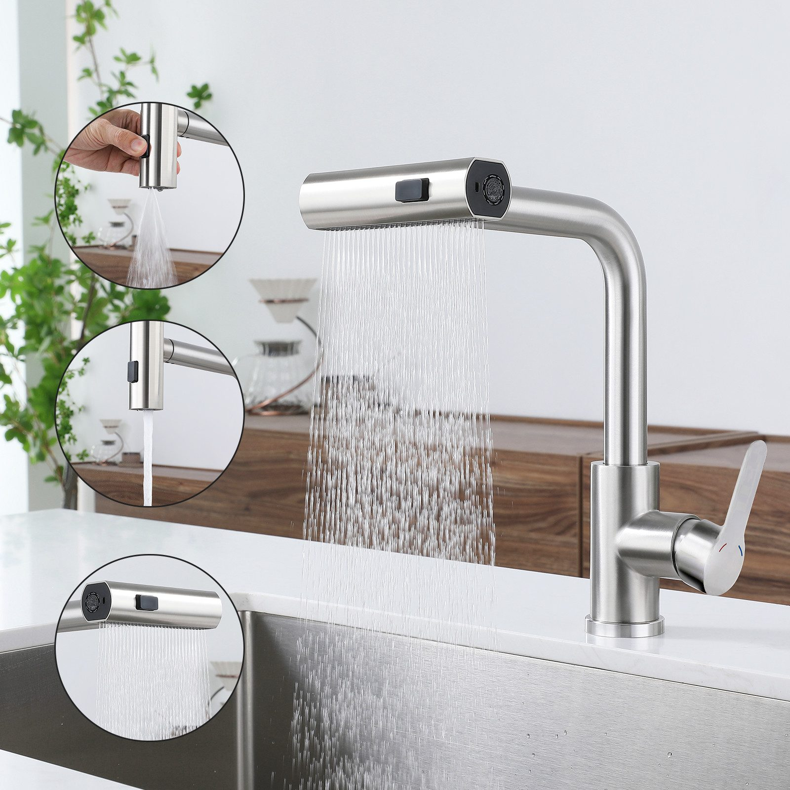 Moderner silberner Küchenwasserhahn mit herausziehbarem Kopf und verschiedenen Wasserstrahloptionen in Aktion.