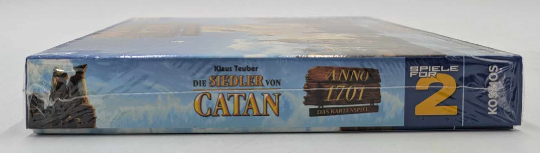 Seitenansicht der Brettspielbox "Die Siedler von Catan" mit Anno 1701.
