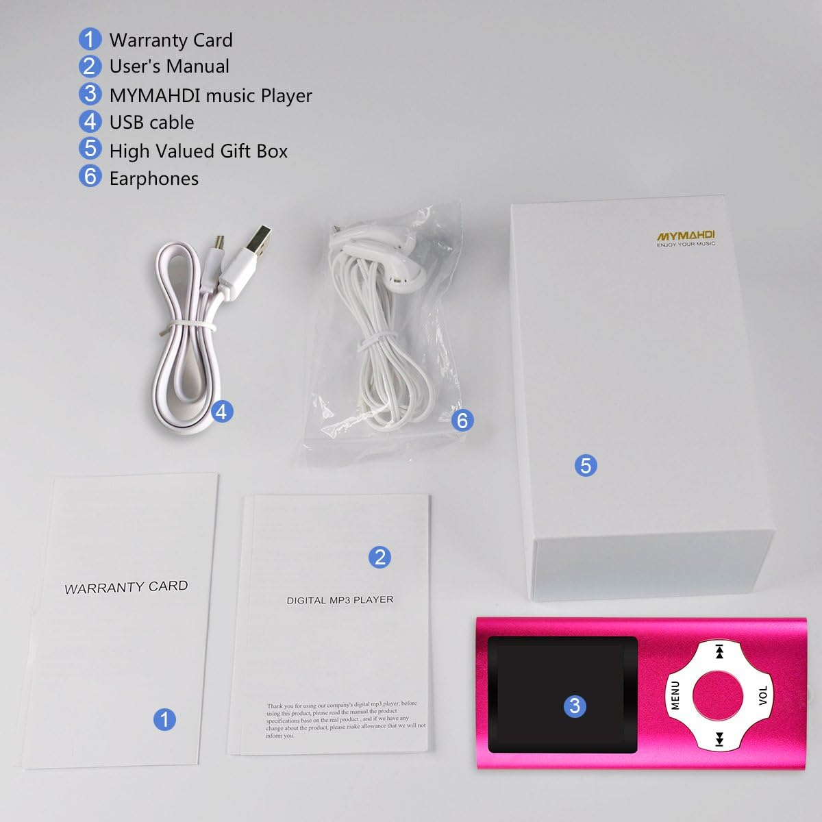 Paketinhalt mit pinkem MP3-Player, Geschenkbox, Handbuch, Garantiekarte, USB-Kabel und Ohrhörern.