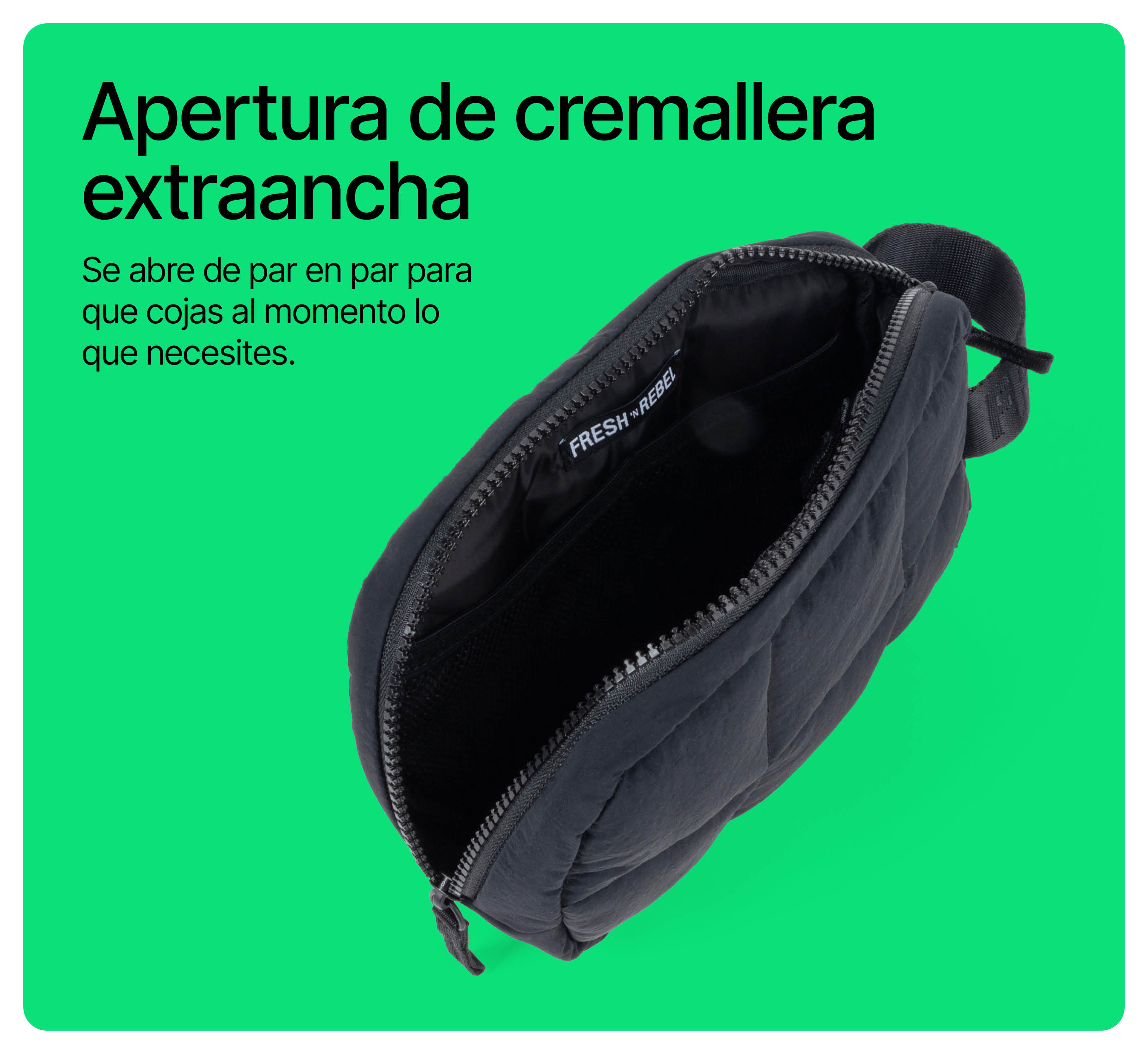 Eine offene schwarze Tasche mit Reißverschluss vor hellgrünem Hintergrund und spanischem Text.