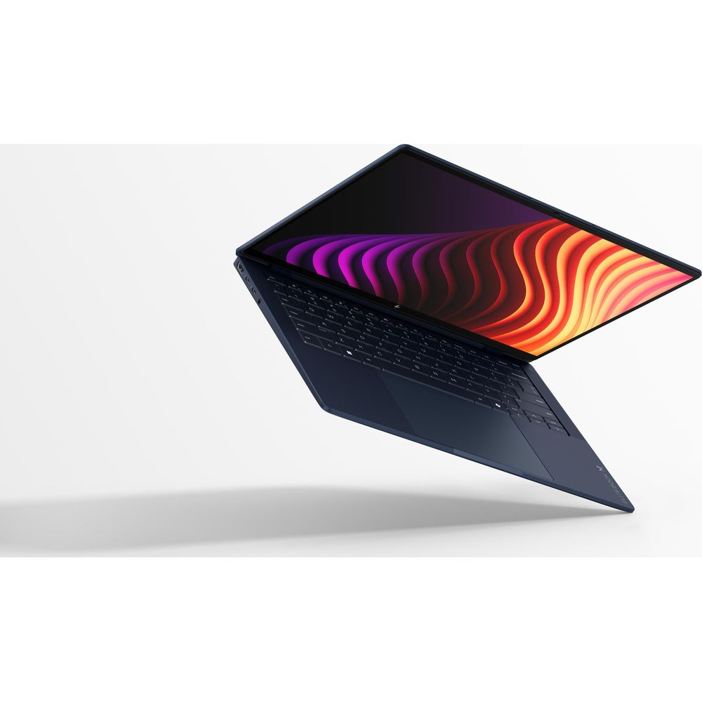 Un computer portatile blu scuro fluttua su uno sfondo bianco con uno schermo colorato.