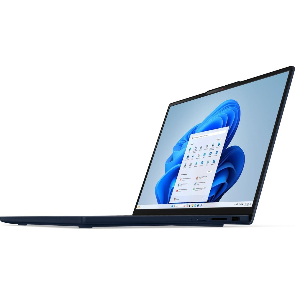 Un ordinateur portable bleu sur fond blanc affiche l'écran de démarrage Windows 11 avec un fond bleu.