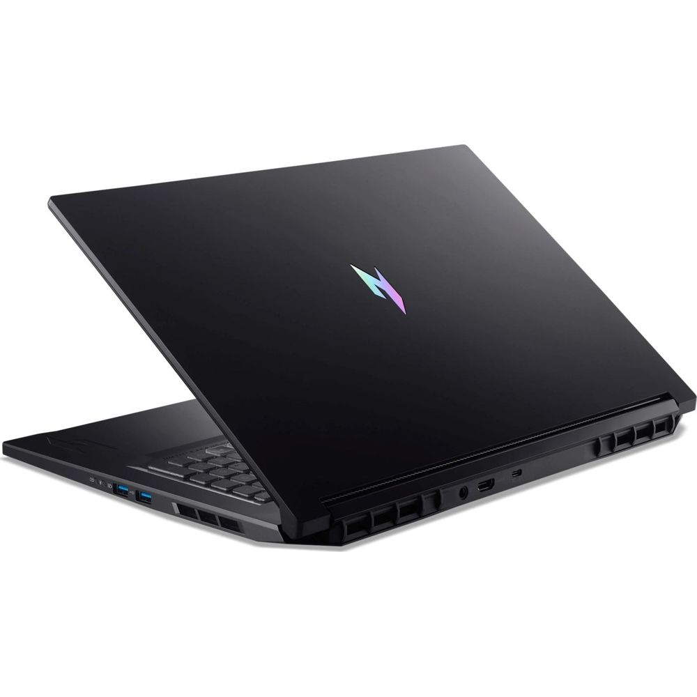 Un ordinateur portable de jeu noir avec un logo lumineux coloré sur le couvercle fermé.