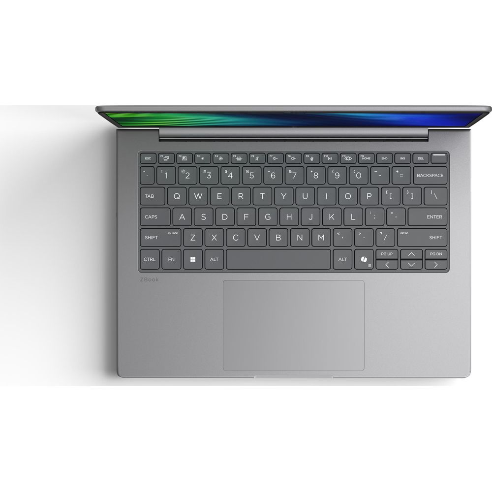 Vista dall'alto di un laptop grigio con tastiera QWERTY, trackpad e sottile cornice dello schermo su sfondo bianco.