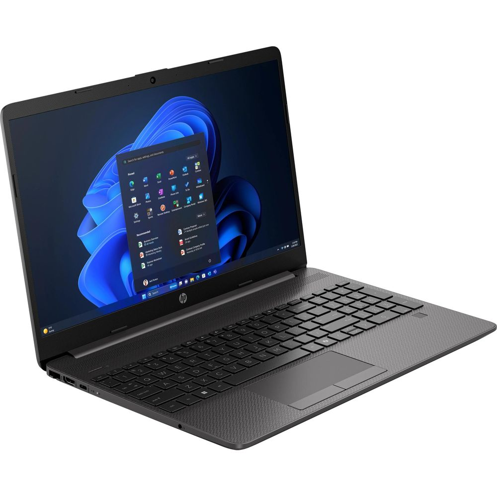 Un ordinateur portable HP noir est ouvert sur une surface blanche, affichant un fond d'écran bleu.