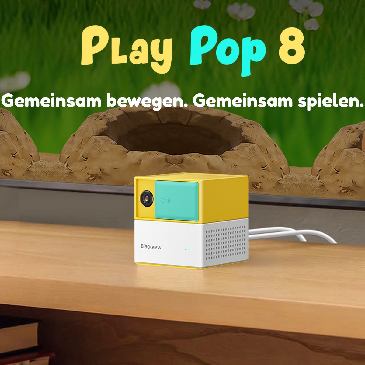 Eine gelb-weiße Blackview Kamera sitzt auf einem Holztisch vor einem Hintergrund mit Text und Maulwurfhügeln.