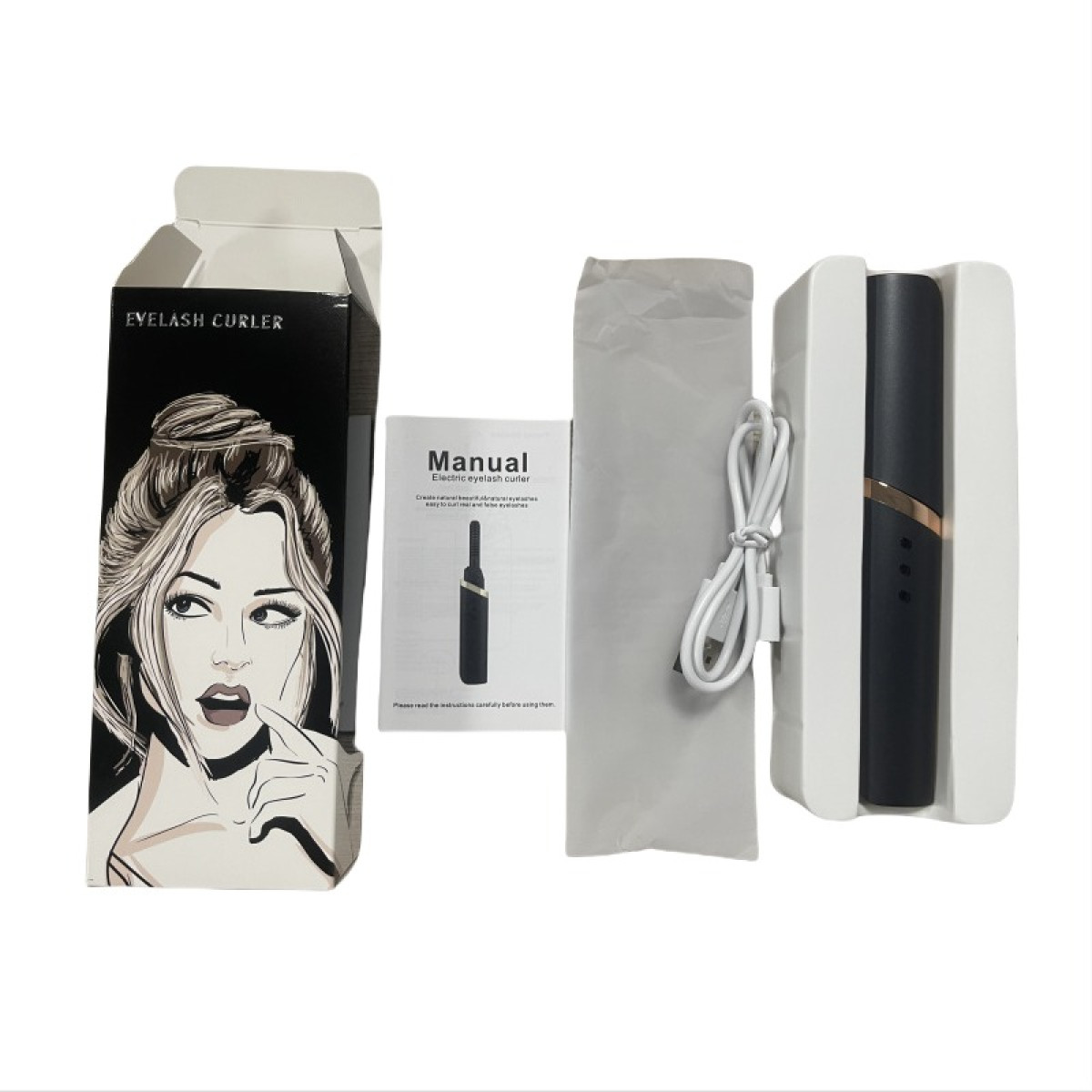 Ein elektrisches Wimpernzangen-Set mit Verpackung, Anleitung, USB-Kabel und dem Gerät in einem weißen Kunststoffhalter.