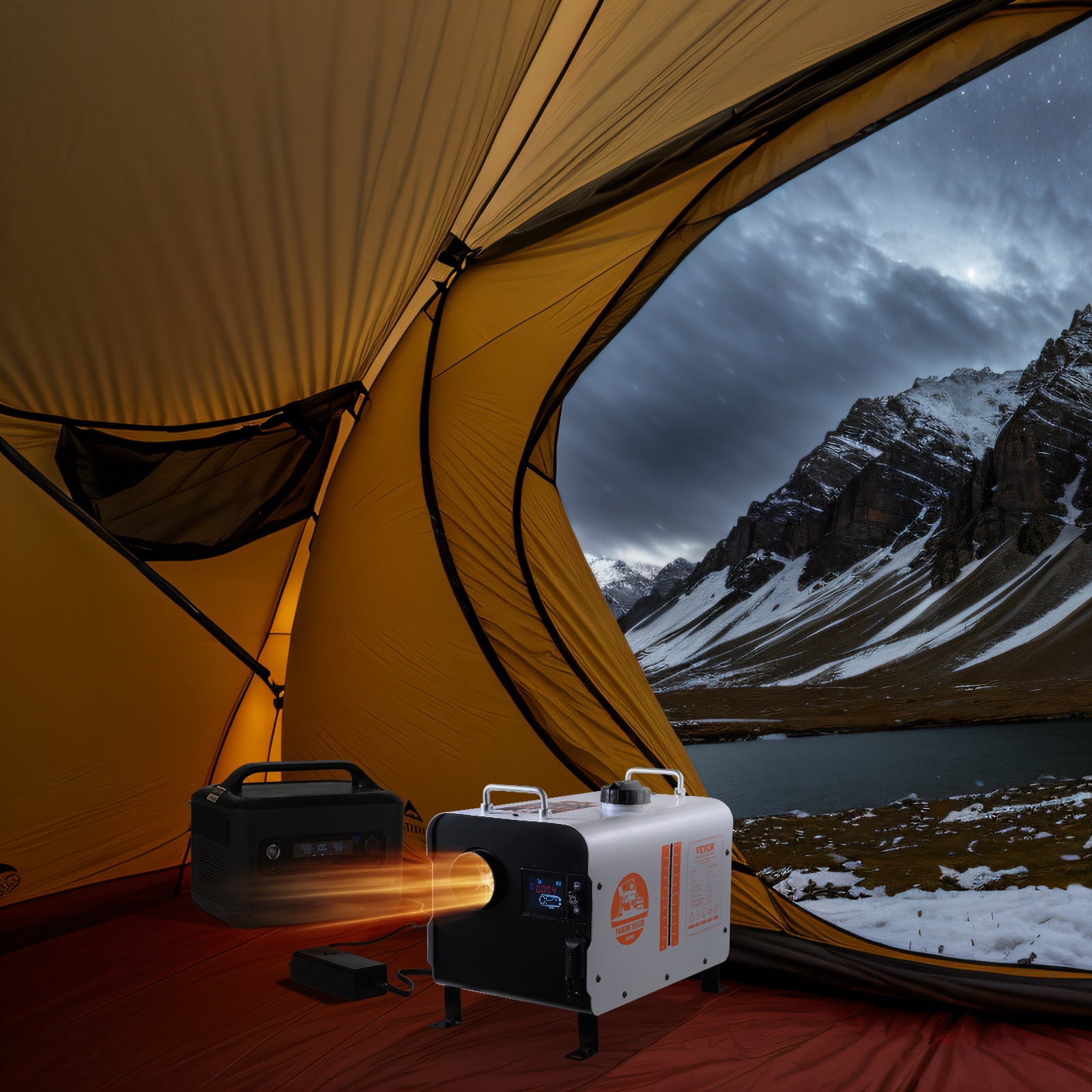 Un calefactor dentro de una tienda naranja con vista a montañas nevadas y un lago por la noche.