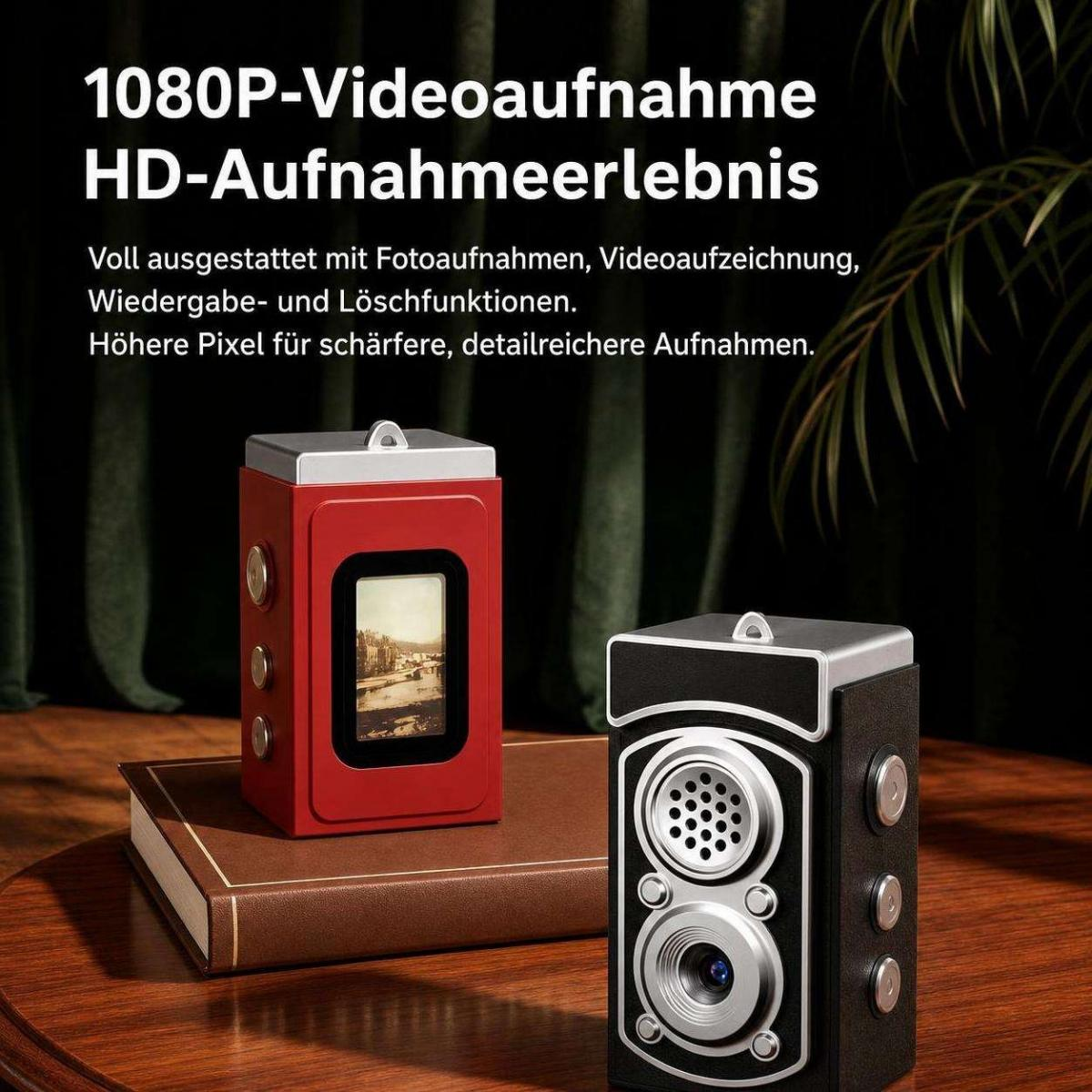 Zwei vintage-artige Retro-Digitalkameras in Rot und Schwarz stehen auf einem Holzschreibtisch vor grünen Pflanzen.