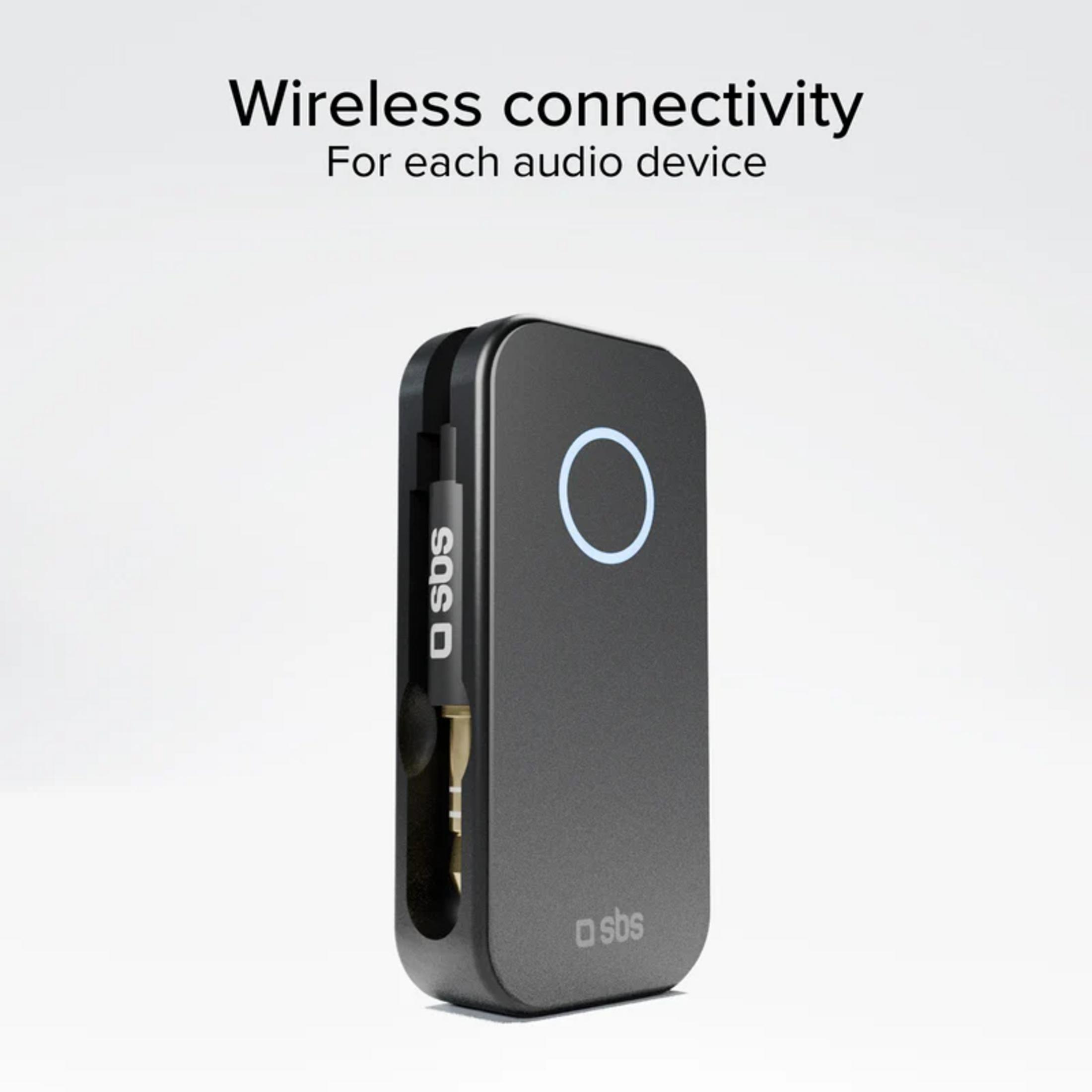 Un adattatore audio wireless nero su sfondo bianco con un anello luminoso.