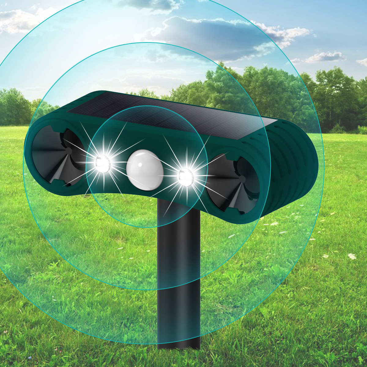 Ein solarbetriebener Schädlingsvertreiber mit Blinklichtern auf einer Wiese.