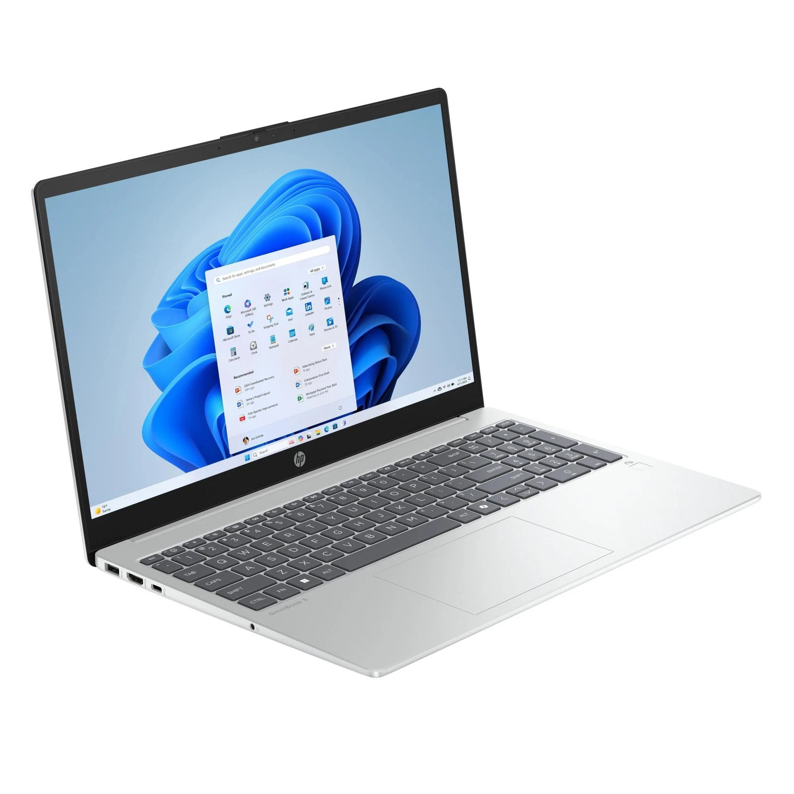 Ein silberner Laptop mit schwarzer Tastatur und Windows 11 Startmenü auf dem Bildschirm.