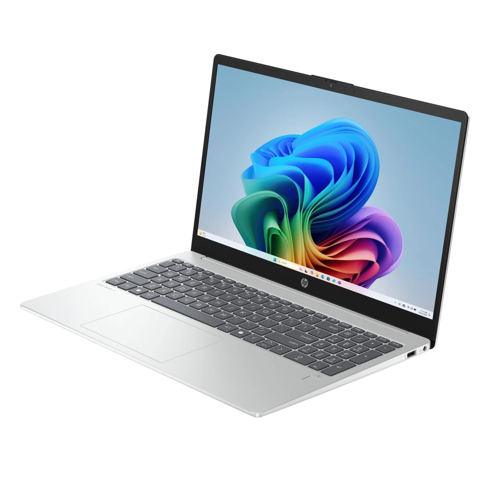 Ein silberner HP-Laptop auf weißem Hintergrund mit buntem abstrakten Hintergrundbild.