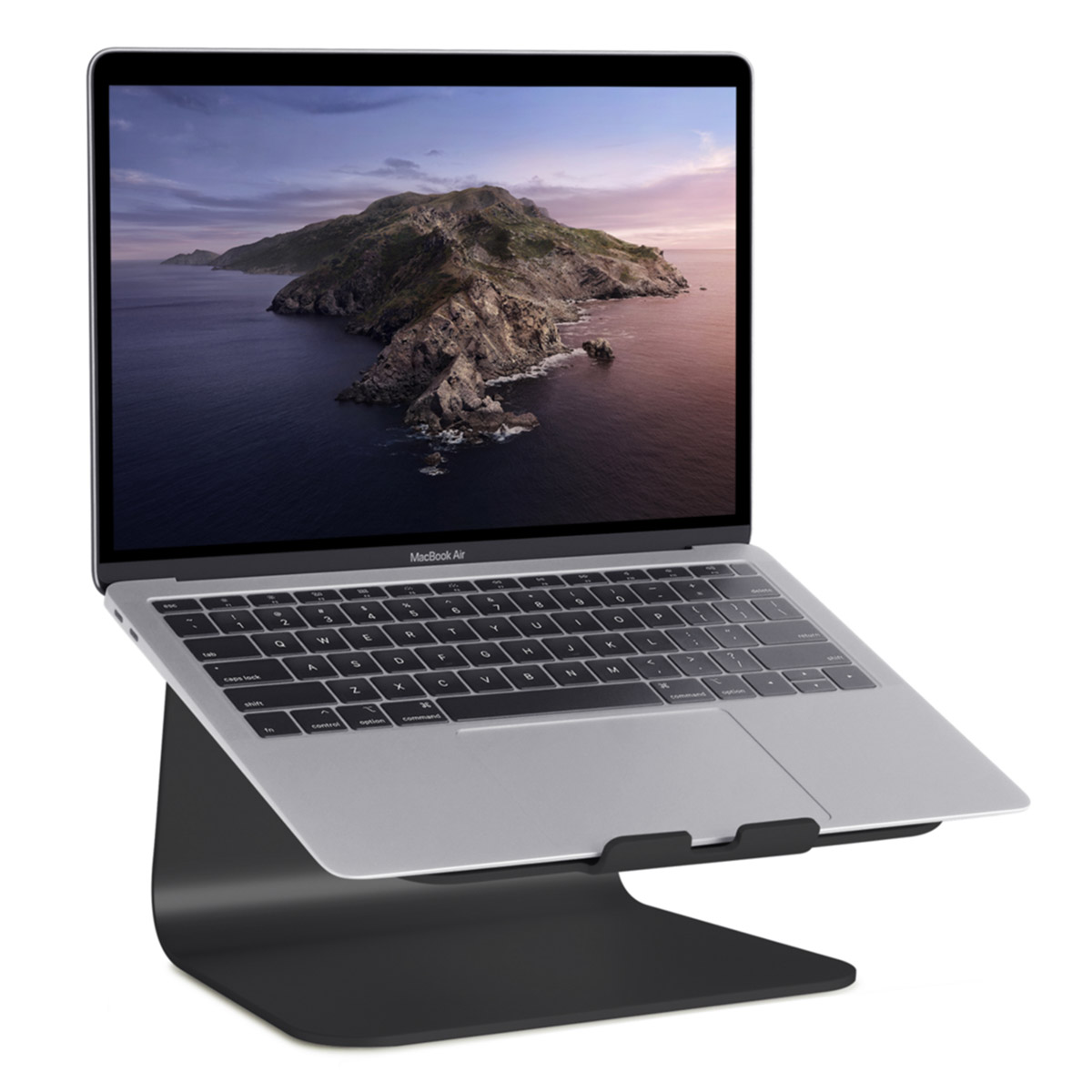 A silver laptop on a black stand featuring a mountain desktop background.
