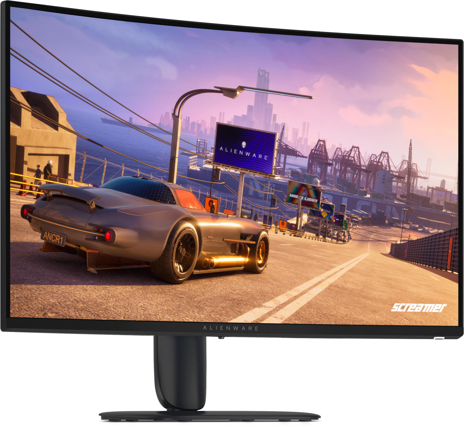 Un monitor curvo Alienware mostra un gioco di corse con un'auto sportiva grigia su sfondo di città e porto.