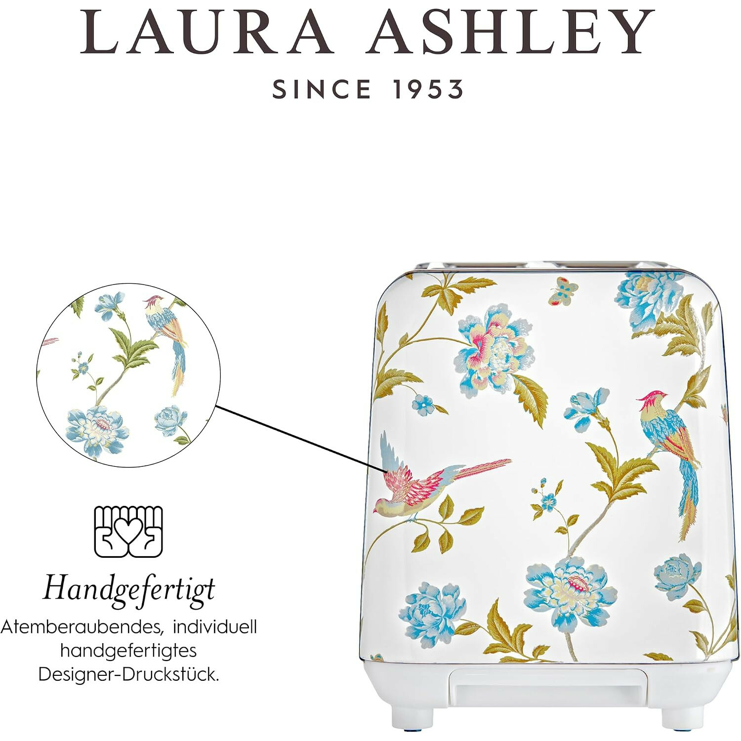Laura Ashley Toaster mit Blumen- und Vogelmuster, weißem Hintergrund und kreisförmigem Ausschnitt.