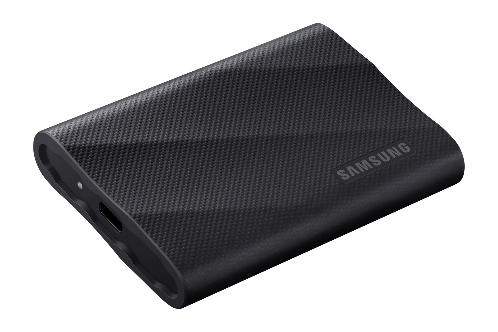 Ein schwarzes Samsung-SSD-Laufwerk mit Kohlefaserstruktur auf schwarzem Hintergrund.