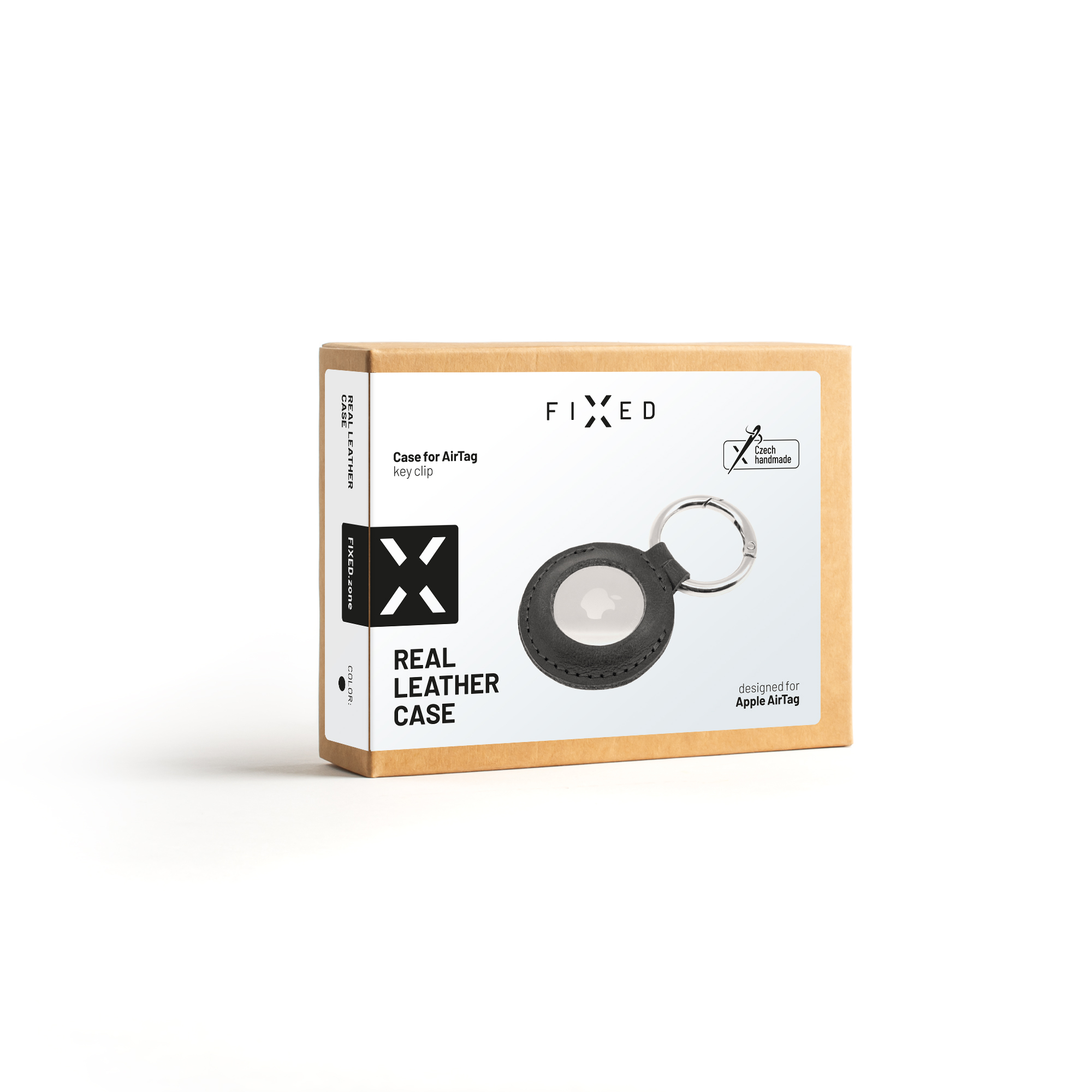 Eine braune Kartonverpackung mit weißem Etikett zeigt eine schwarze Echtlederhülle für Apple AirTag mit Schlüsselring.