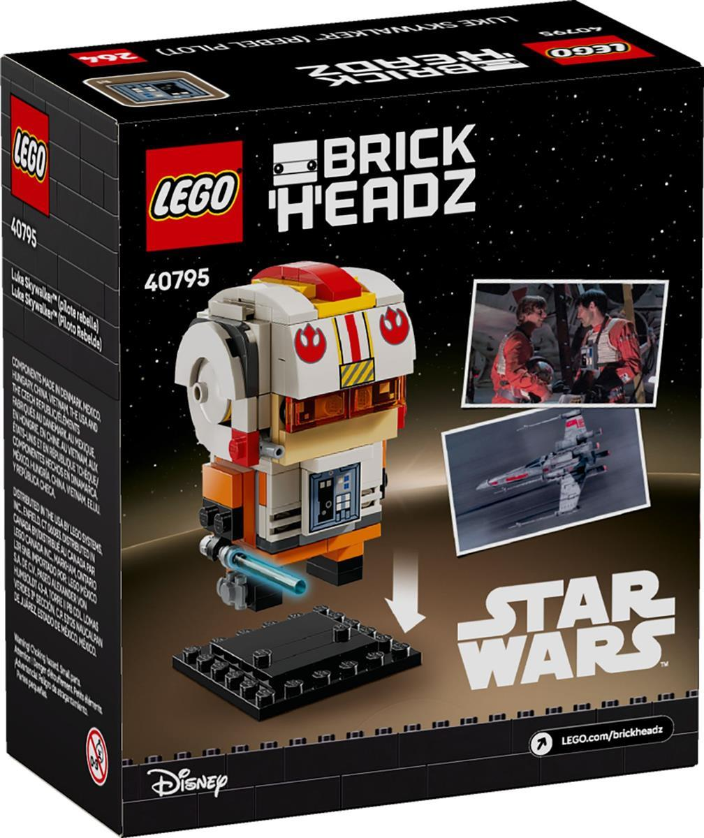 Lego Star Wars BrickHeadz Luke Skywalker Rebell-Pilot Set-Verpackung mit Figur auf schwarzem Sockel.