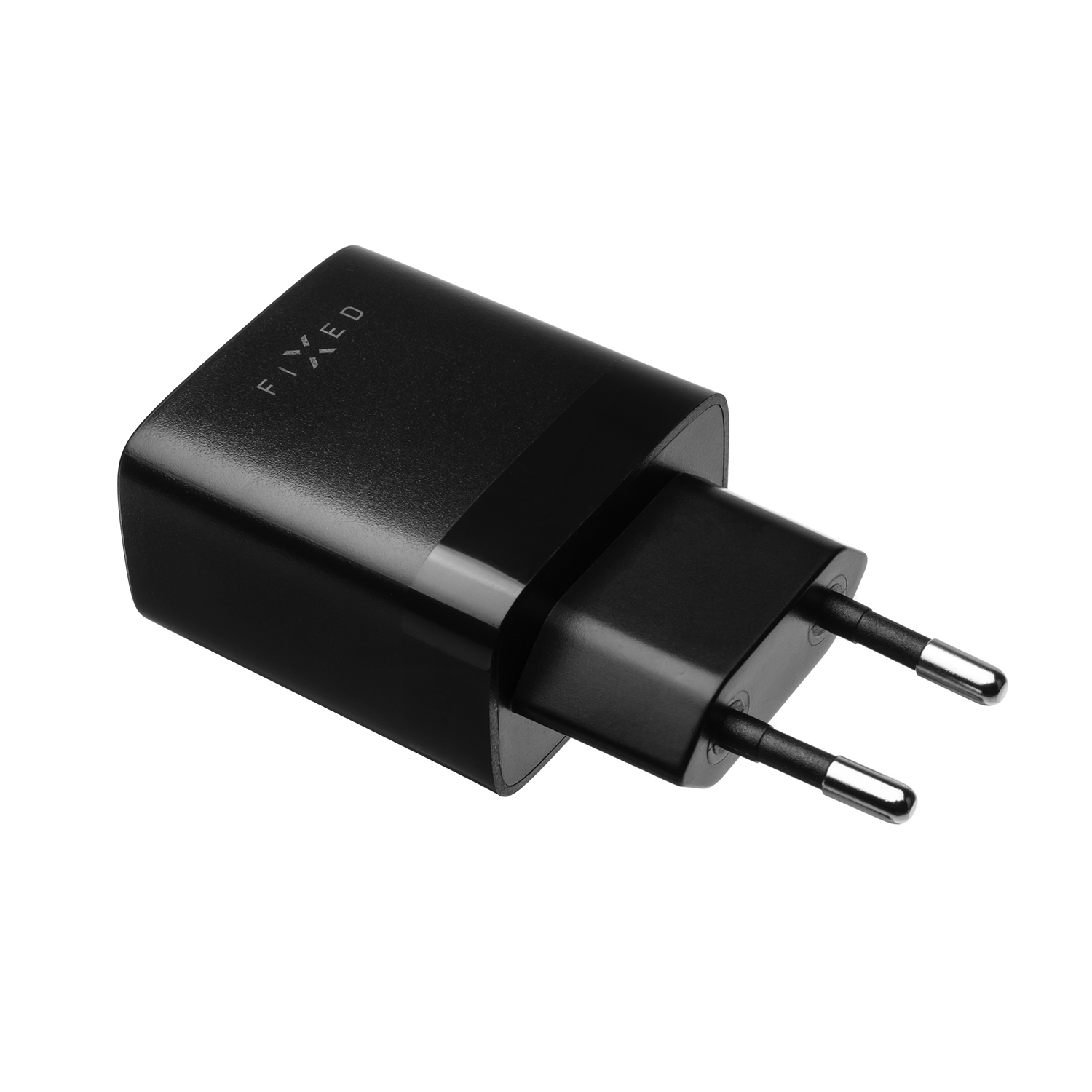 Ein schwarzes Ladegerät mit europäischem Stecker und dem Markennamen FIXED oben drauf.