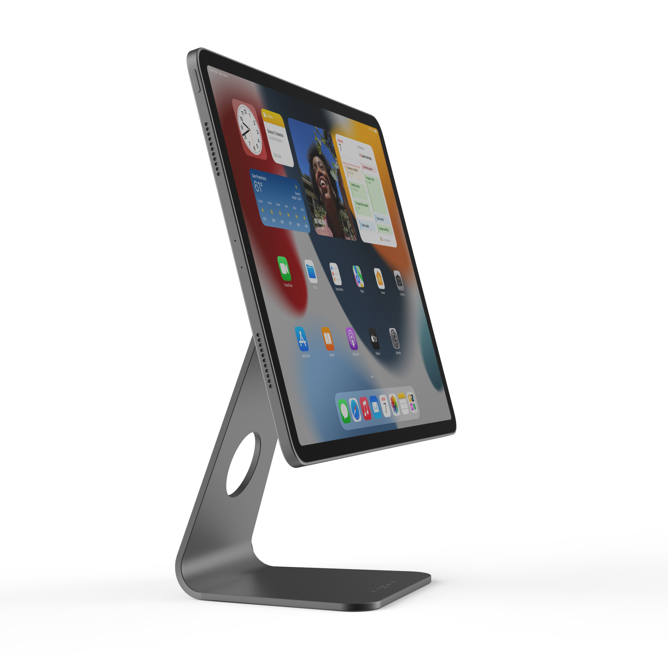 Ein graues Tablet ist auf einem passenden Metallständer montiert und zeigt einen bunten Startbildschirm.