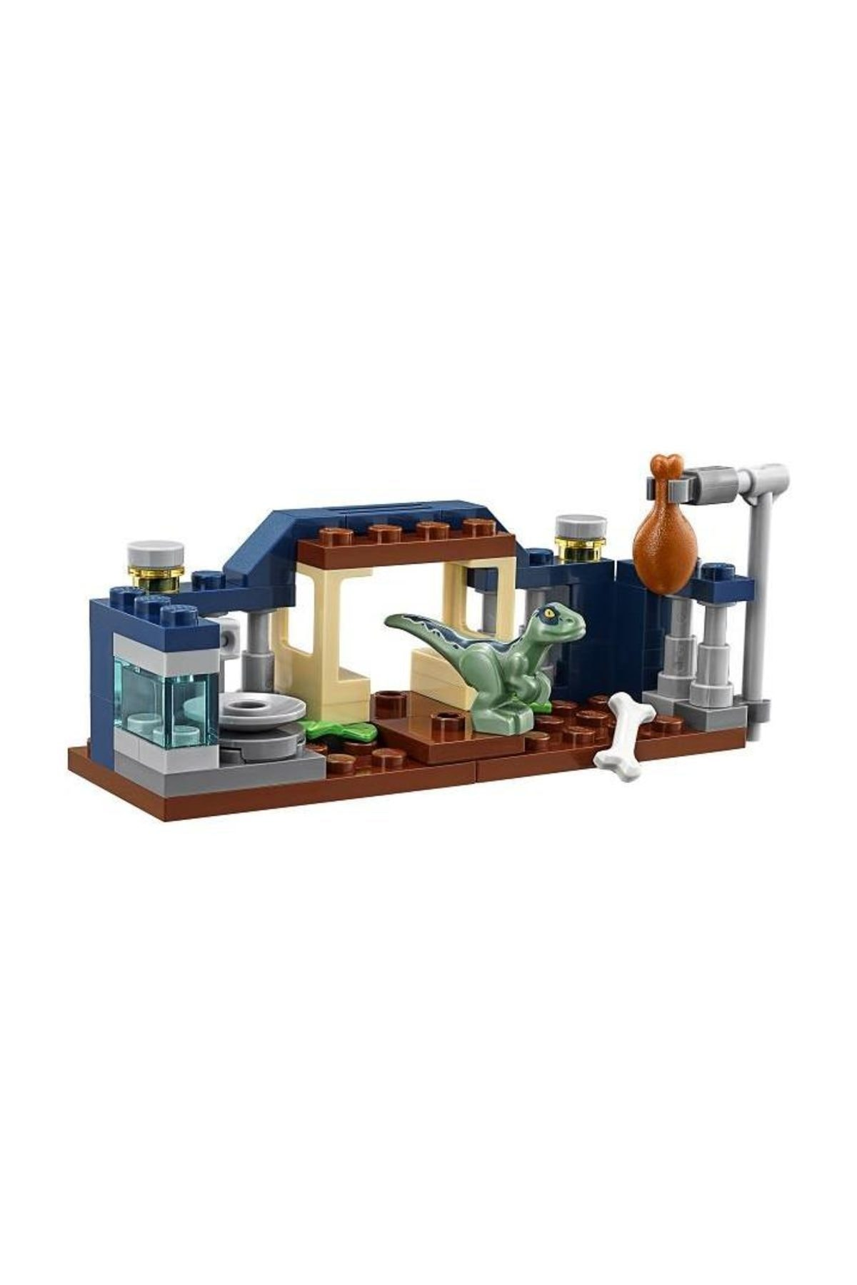 Set dinosauro Lego con raptor verde, coscia di pollo, osso e struttura blu su base marrone.