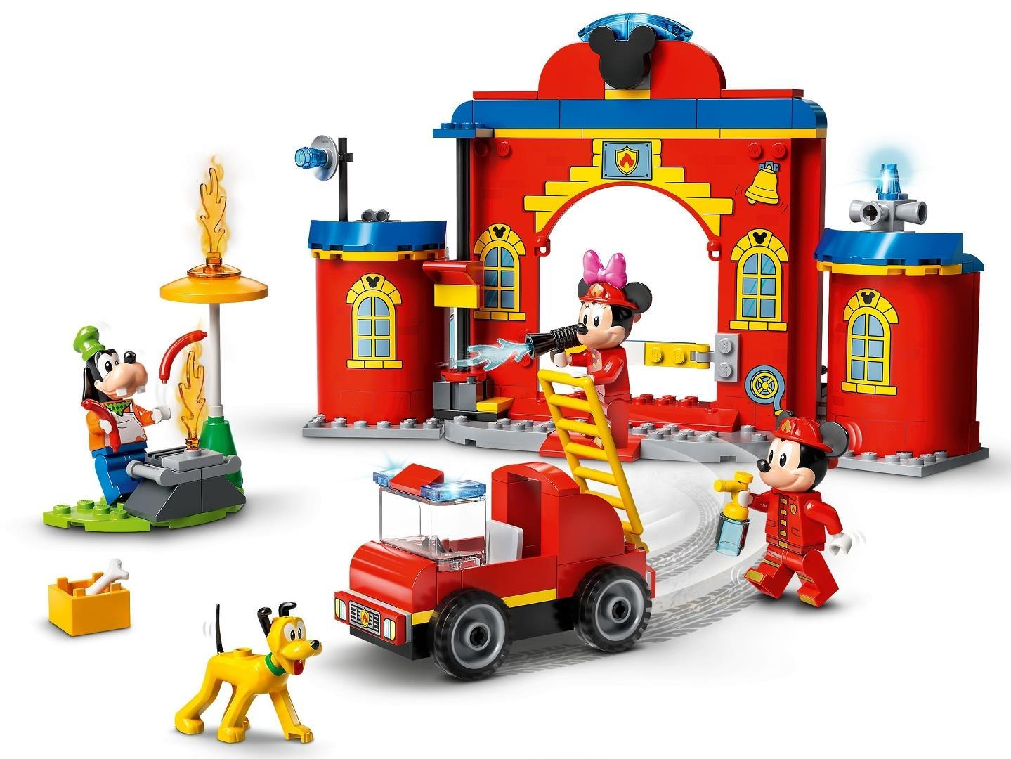 Lego-Feuerwehrwache mit Minnie, Micky, Goofy und Pluto sowie einem roten Feuerwehrauto und Grill.