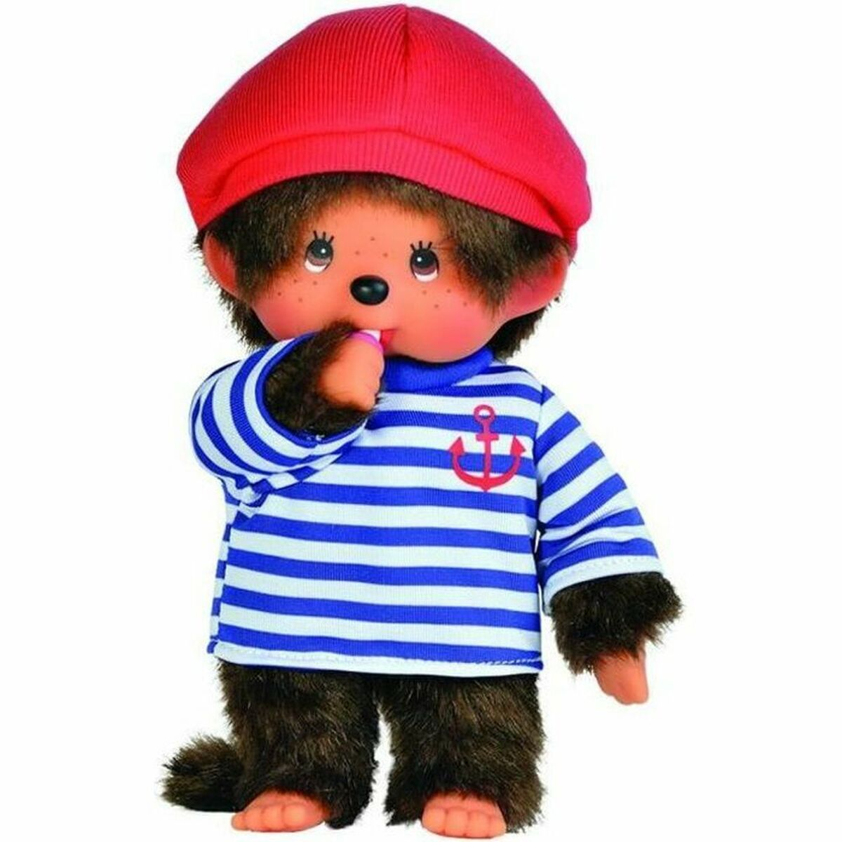 Eine Monchhichi-Puppe mit rotem Baret und blau-weiß gestreiftem Matrosenhemd mit Anker.