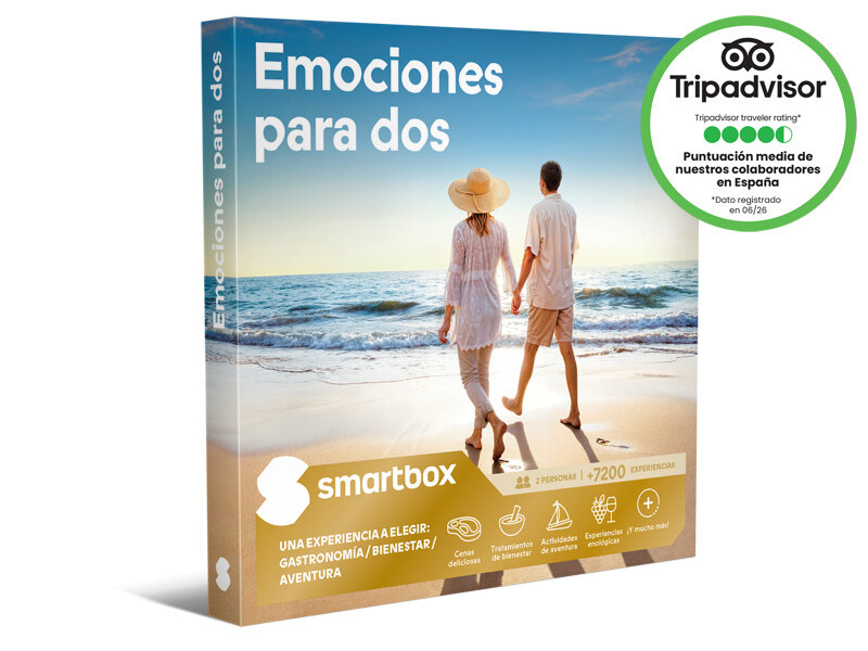 Caja regalo Smartbox Emociones para dos con una pareja paseando descalza por la playa.