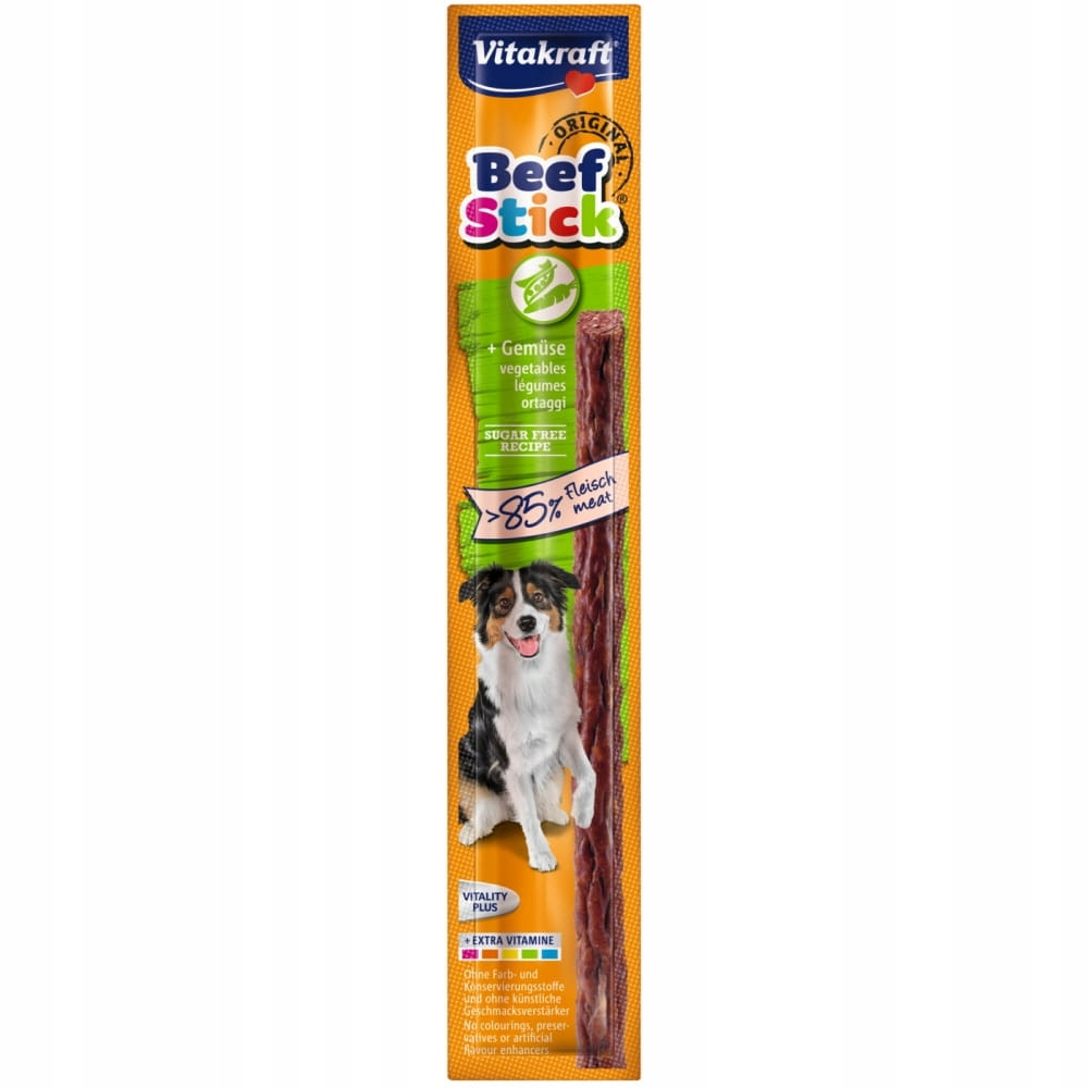 Vitakraft Beef Stick z warzywami i psem na pomarańczowym opakowaniu.