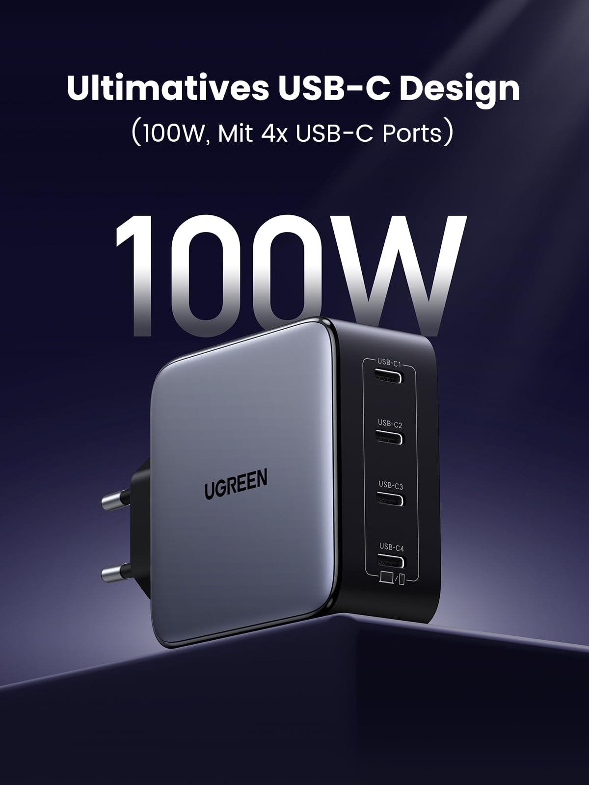 Ein schwarzes Ugreen 100W USB-C Netzteil mit vier USB-C-Anschlüssen vor dunkelblauem Hintergrund.