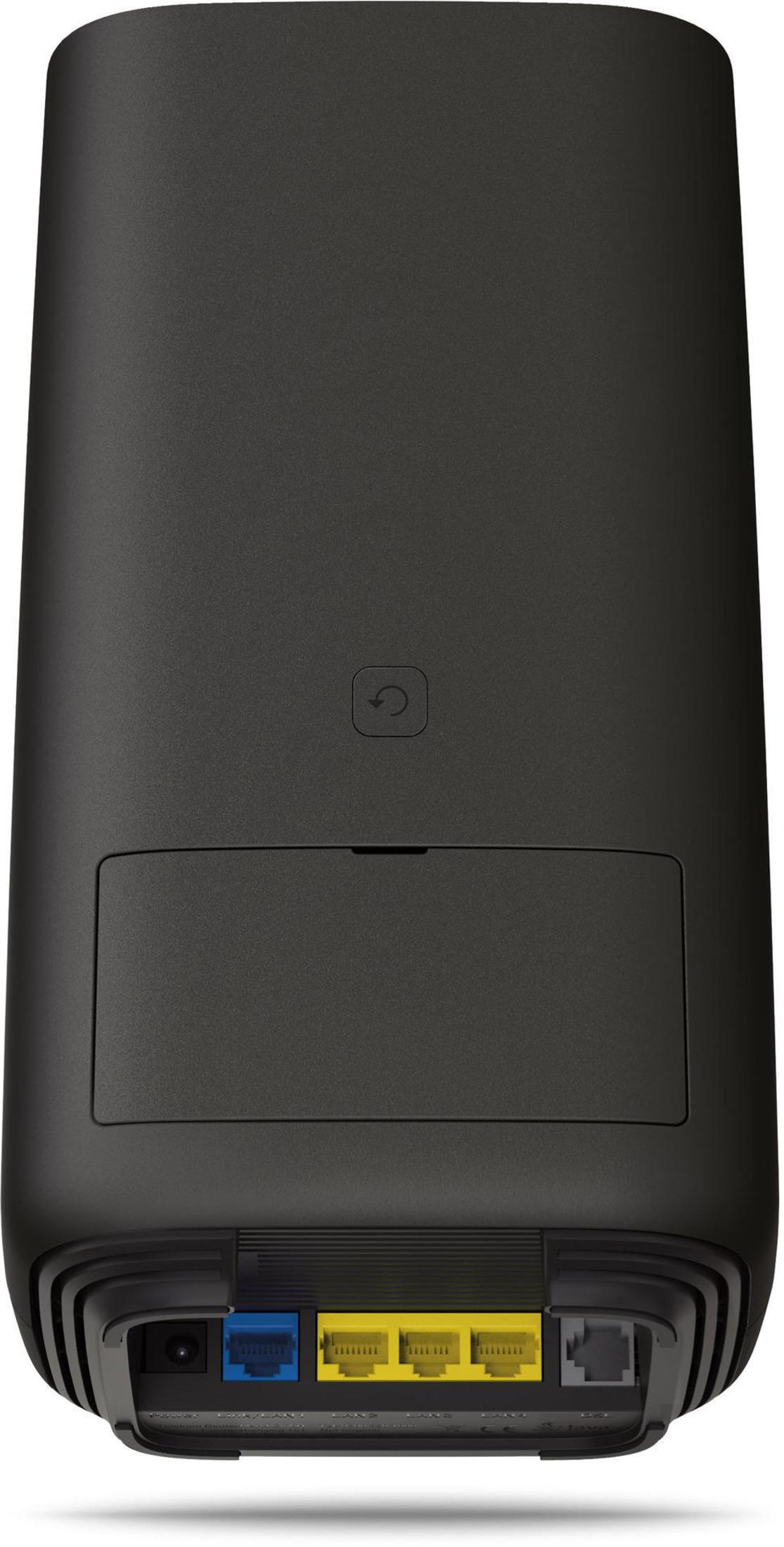 Ein schwarzer Router mit Tasten und bunten Anschlüssen.