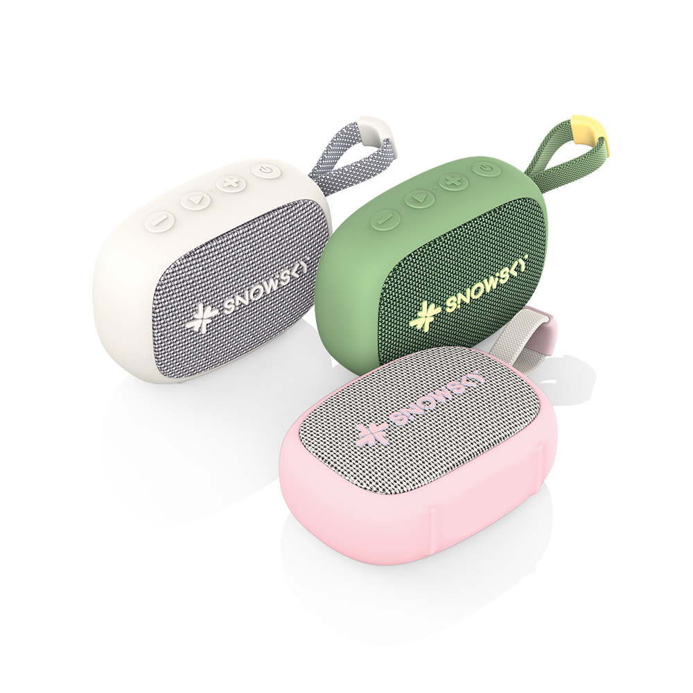 Trzy przenośne głośniki Bluetooth w kolorze białym, zielonym i różowym z paskiem.