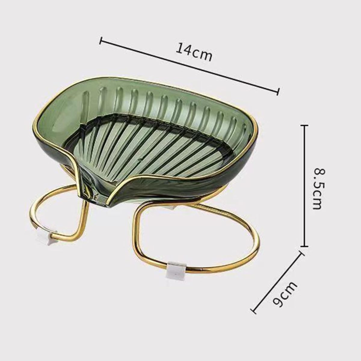 Eine grüne blattförmige Seifenschale mit goldenem Metallständer, Maße: 14 cm, 8,5 cm und 9 cm.