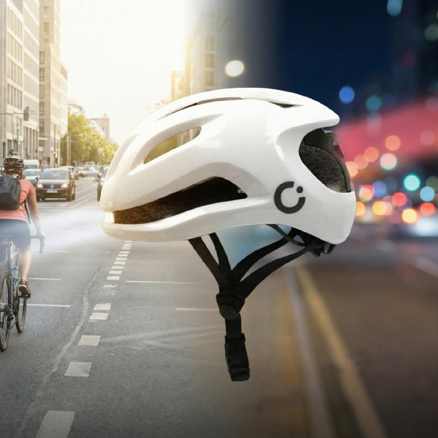 Un casco de bicicleta blanco se muestra contra un fondo dividido de una calle de la ciudad de día y de noche.
