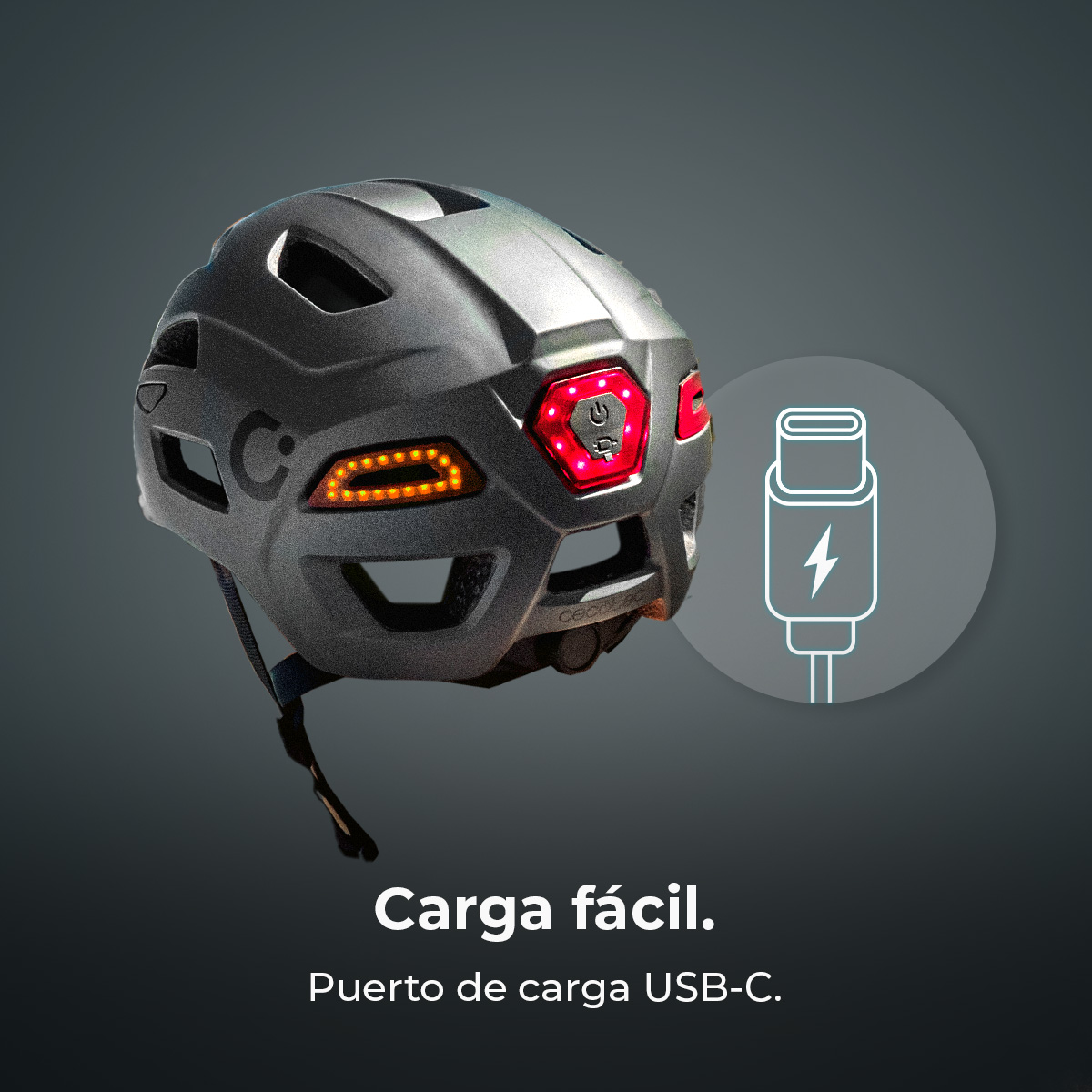 Casco de bicicleta gris con luces LED rojas y naranjas traseras y un icono de carga USB-C.