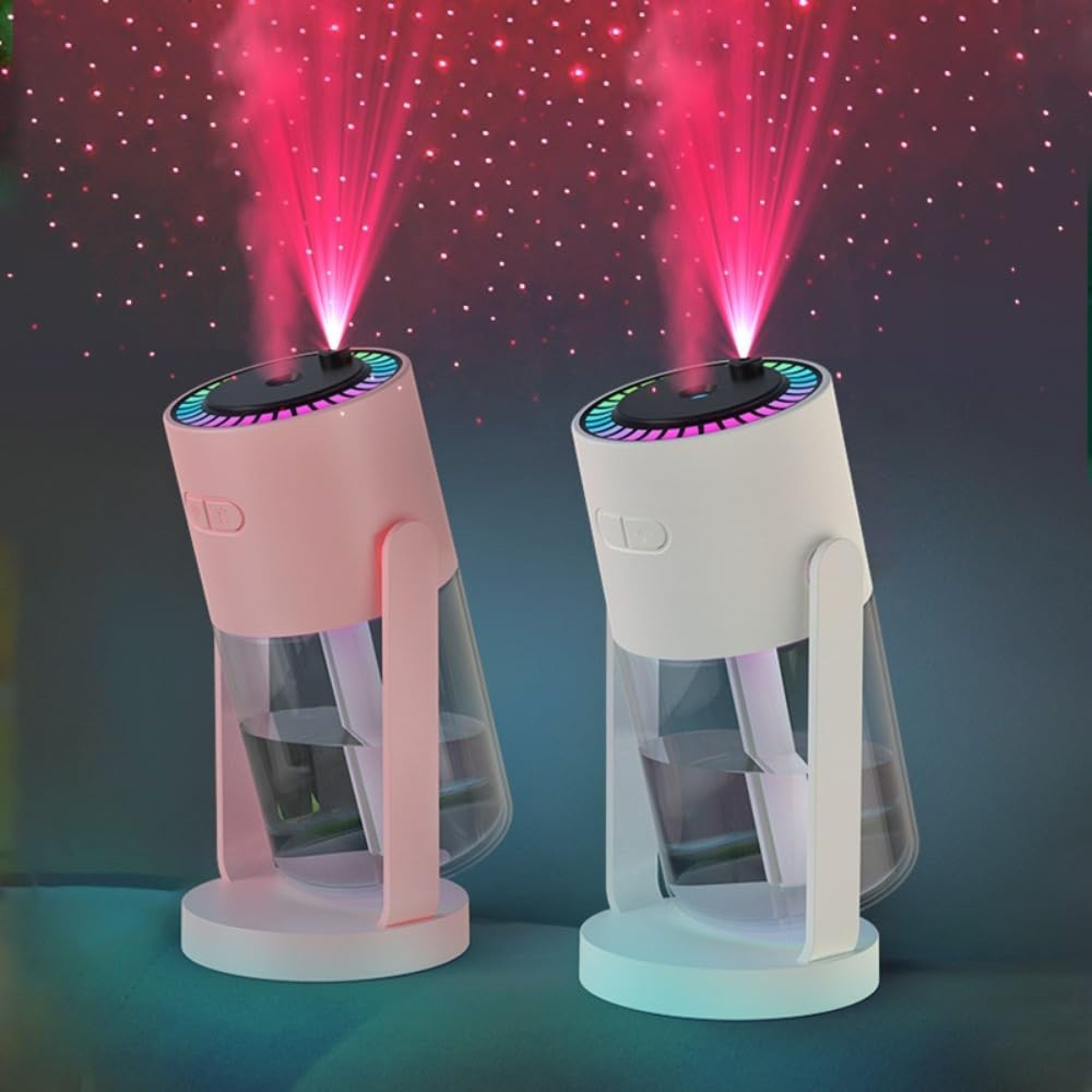 Zwei moderne Luftbefeuchter in Rosa und Weiß mit rotem Lichteffekt.