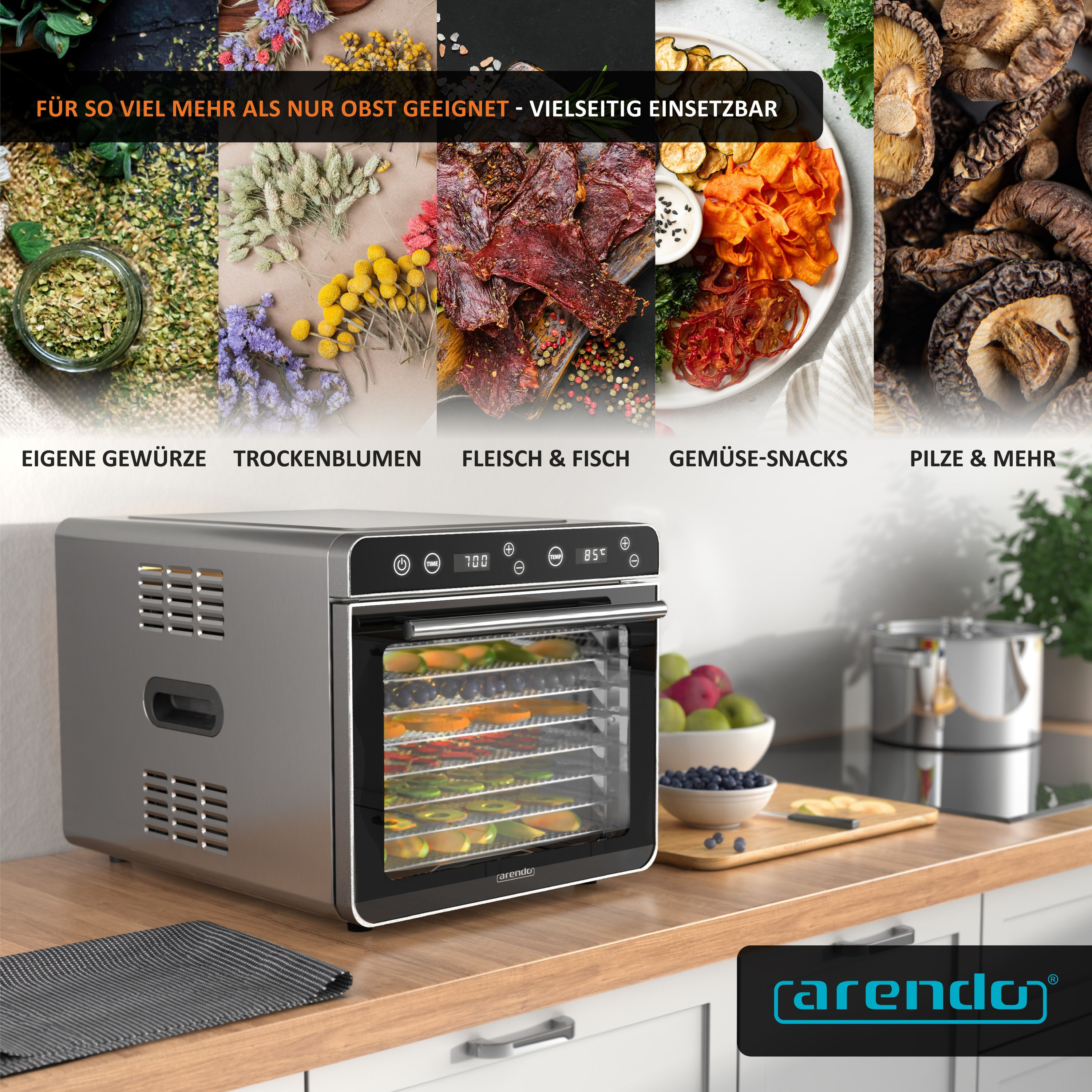 Ein silberner Arendo Dehydrator steht in einer Küche mit Trockenfutter auf den Schalen und Obst im Hintergrund.
