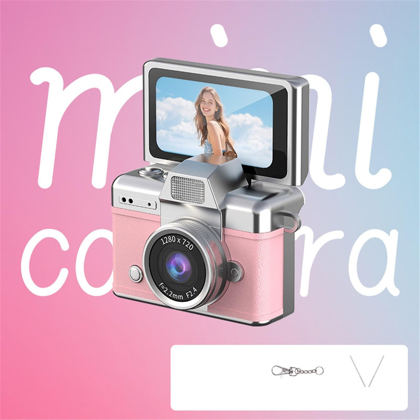 Eine rosa und silberne Mini-Kamera mit umklappbarem Bildschirm vor einem rosablauen Hintergrund mit der Aufschrift mini camera.