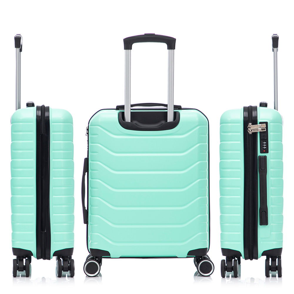 Tres maletas rígidas de color verde menta mostradas desde diferentes ángulos sobre fondo blanco.