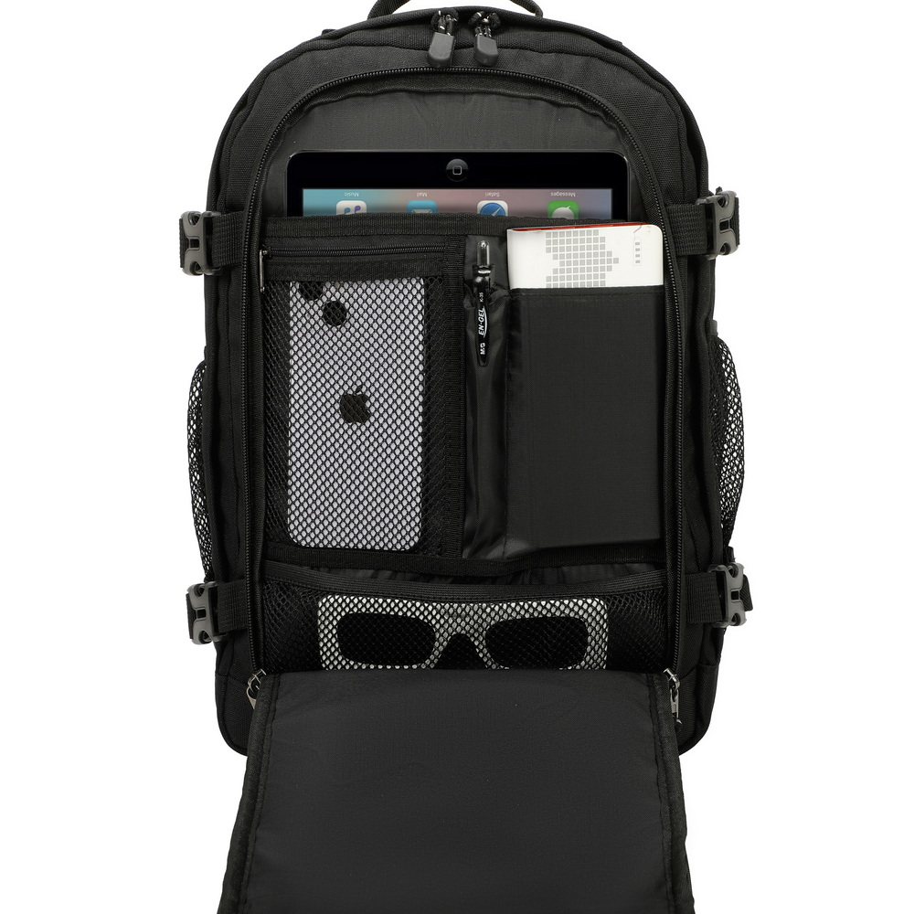 Una mochila negra con un compartimento delantero abierto que muestra una tableta, móvil, gafas y un cuaderno.