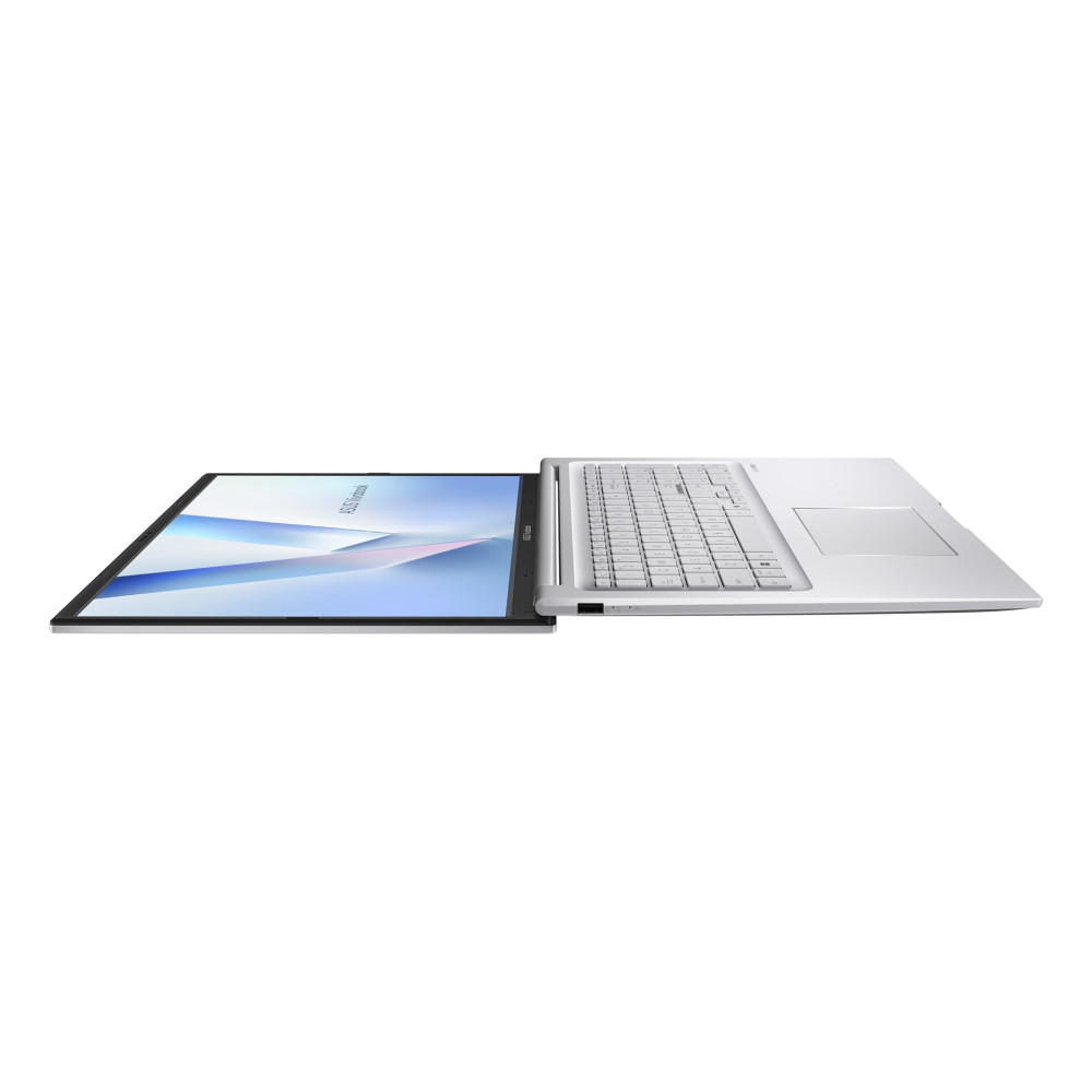 Srebrny laptop leży płasko na białym tle, pokazując klawiaturę i wyświetlacz.