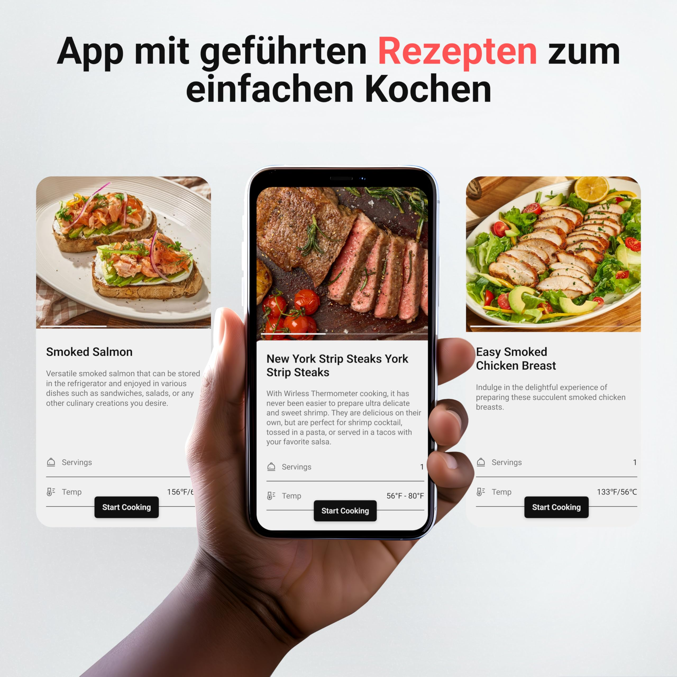 Eine Hand hält ein Smartphone mit einer Koch-App für Steak-, Lachs- und Hähnchenrezepte.