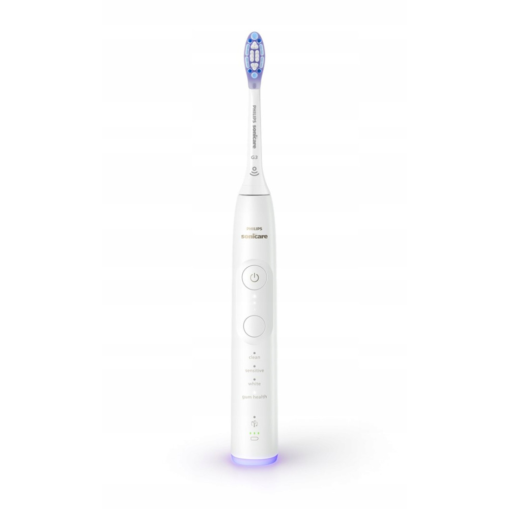 Uno spazzolino elettrico Philips Sonicare bianco con testina viola e base illuminata.
