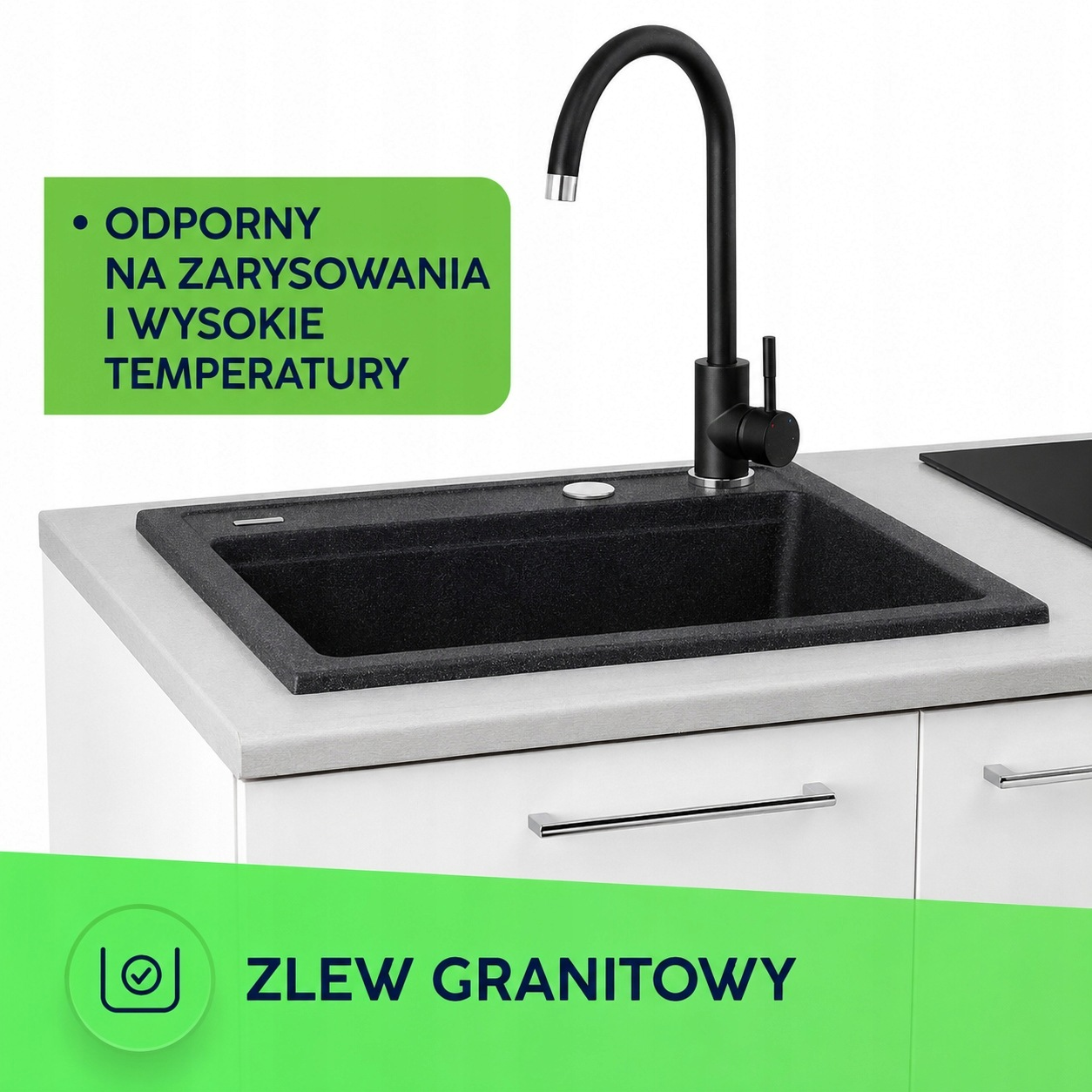 Czarny zlewozmywak granitowy z pasującą czarną baterią na białym blacie.