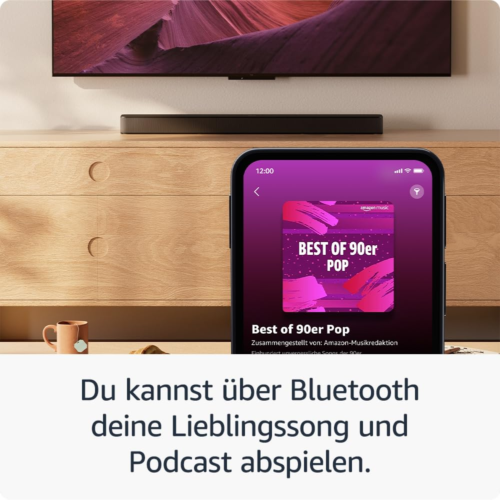 Un smartphone affiche une application musicale avec 'Best of 90er Pop' devant une télévision.