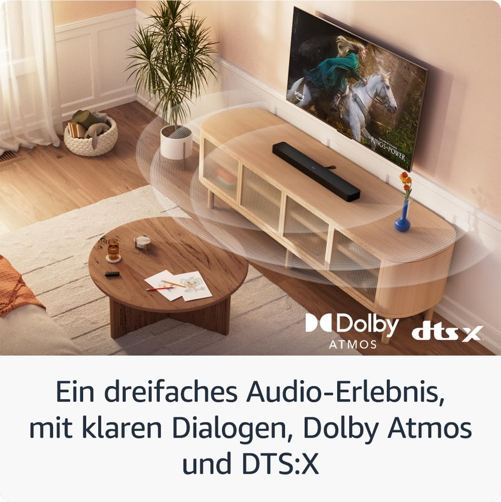 Salon avec TV, barre de son sur meuble en bois et table ronde, avec logos Dolby Atmos et DTS:X.